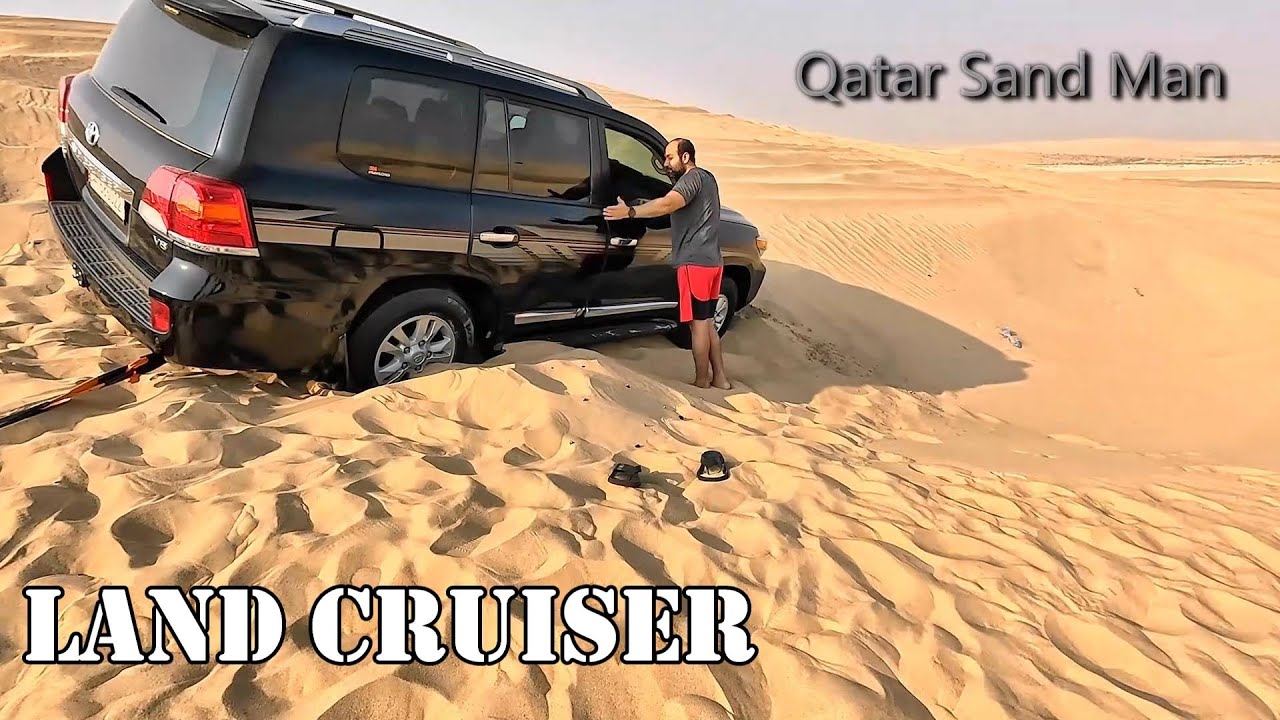 Toyota Land Cruiser, stuck in sand dunes, Warn winch recovery. مغرس في سيلين