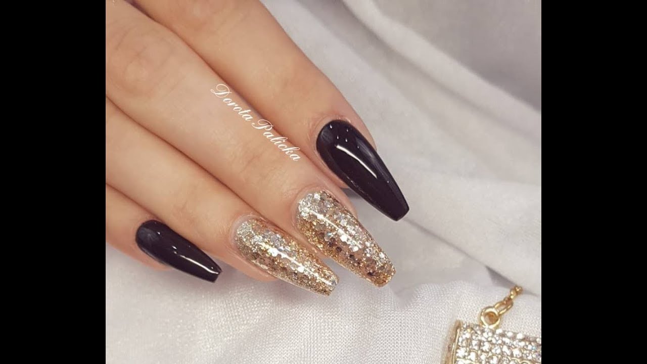 Rebalance Salon coffin gel nails with black gel polish and encapsulated glitter