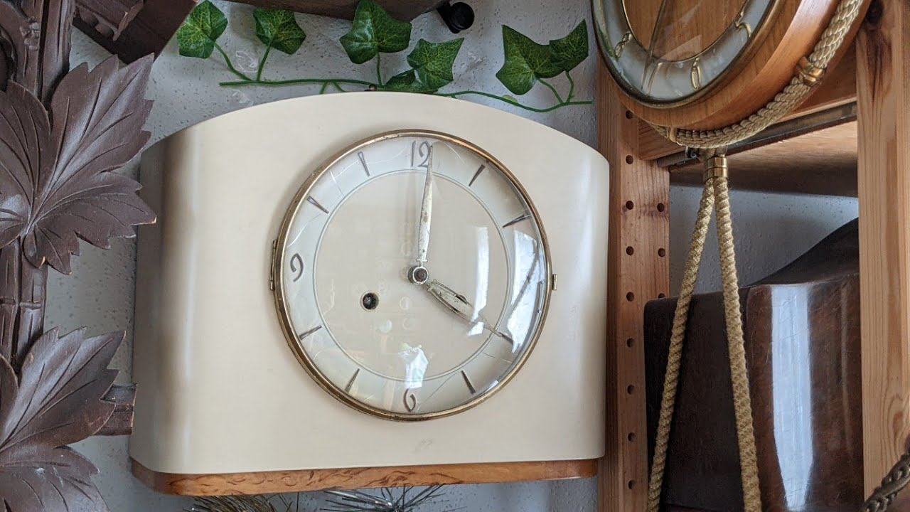 (26) Small white Mauthe 1930's pendulum wall clock with a mantel clock movement and date sticker!