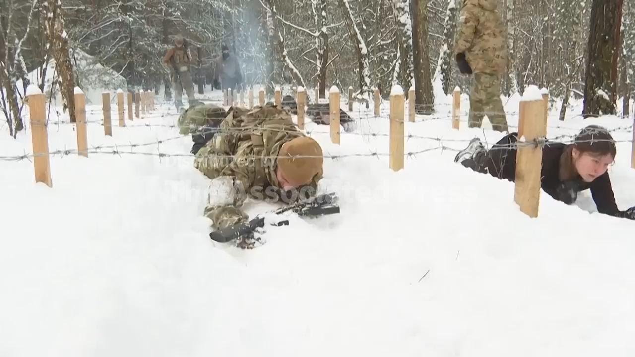 Frost grips the training grounds of Kyiv region as veterans give civilians basic military skills