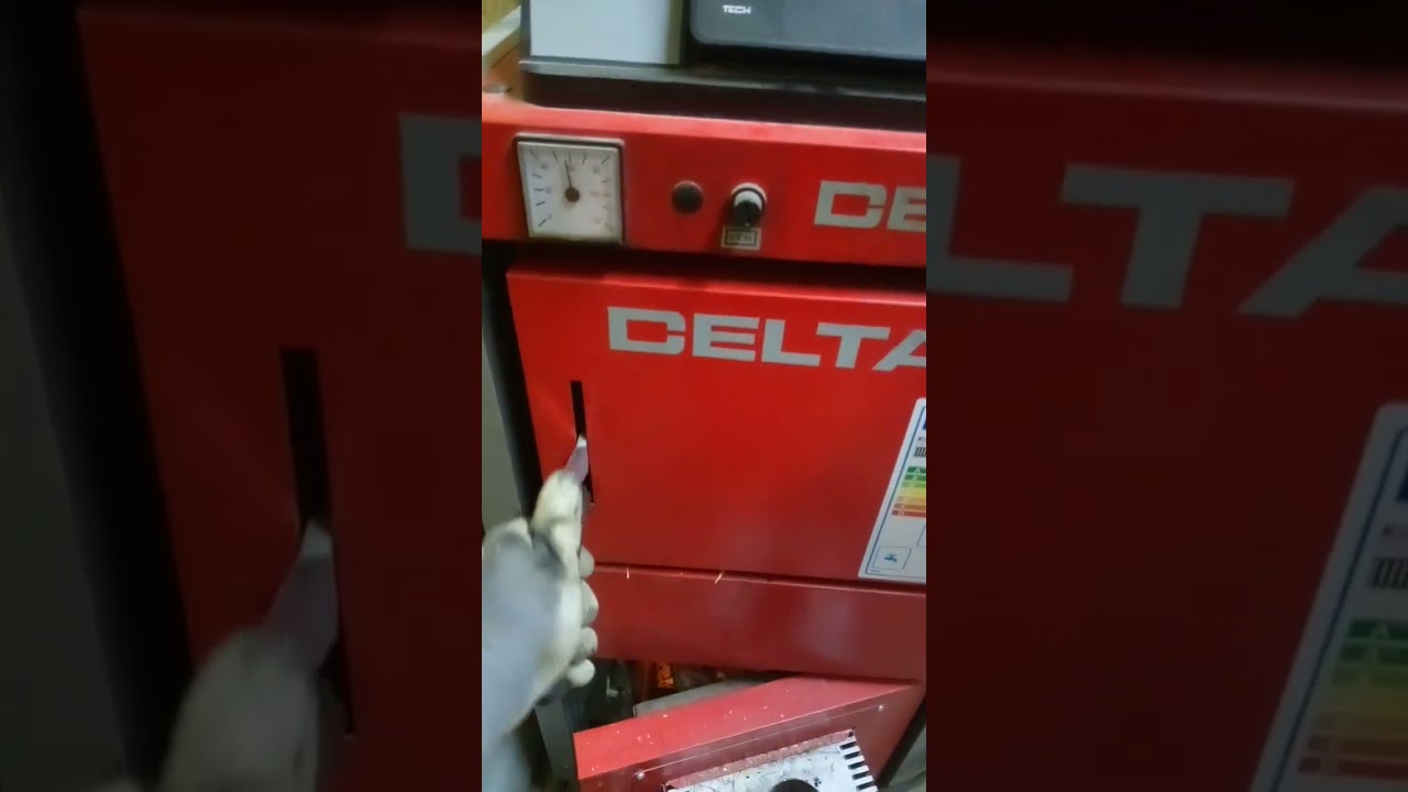 palenie drewnem w kotle pelletowym Defro Delta Ekopell