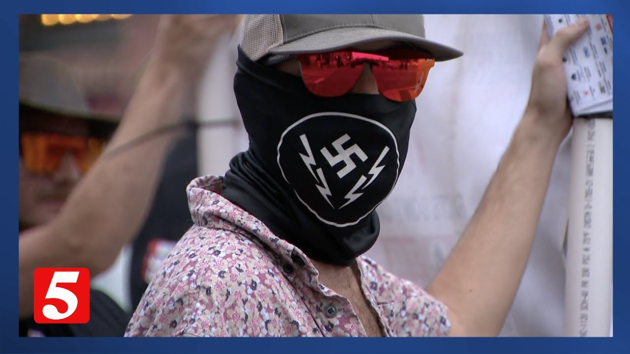 Nazi flags and 'pro white' T-shirts: Hate group passes out flyers on Broadway