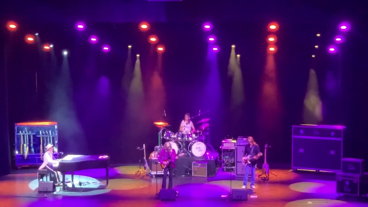 Elton John’s “I’ve Seen That Movie Too” performed by Kenny Metcalf as Elton and The Early Years Band