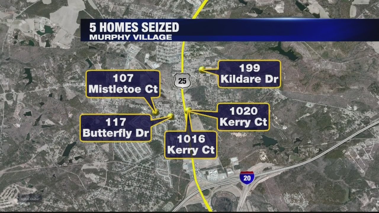 5 homes and 25 cars seized after Murphy Village indictment