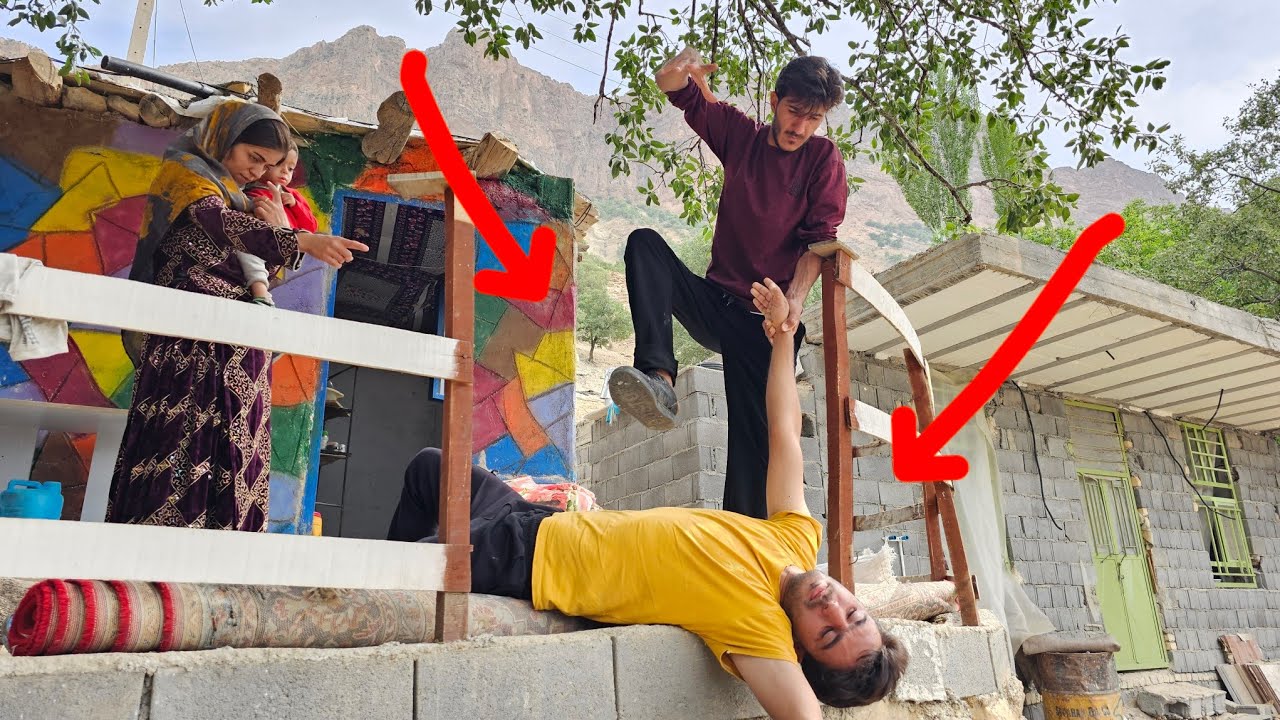 Cementing the fence: a remarkable collaboration between Khadijeh and the teacher.