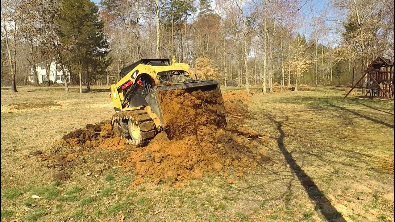 Cutting a large swale to improve yard drainage