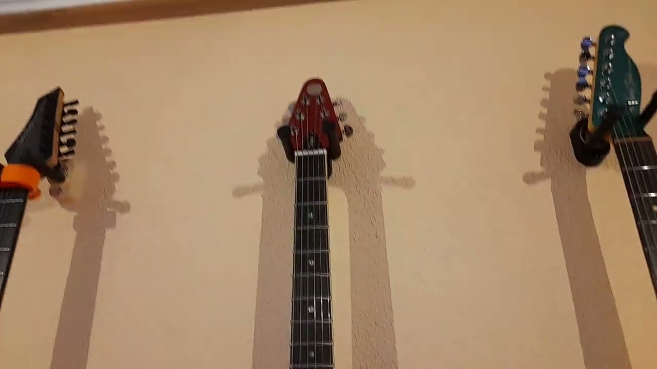 LAS GUITARRAS COLGADAS DE UN 