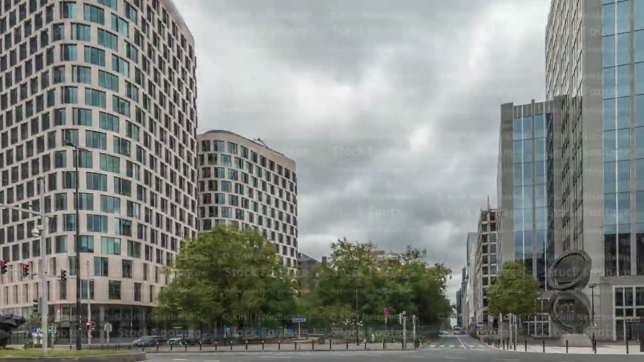 Timelapse panorama of traffic and modern office buildings in the business district on Boulevard