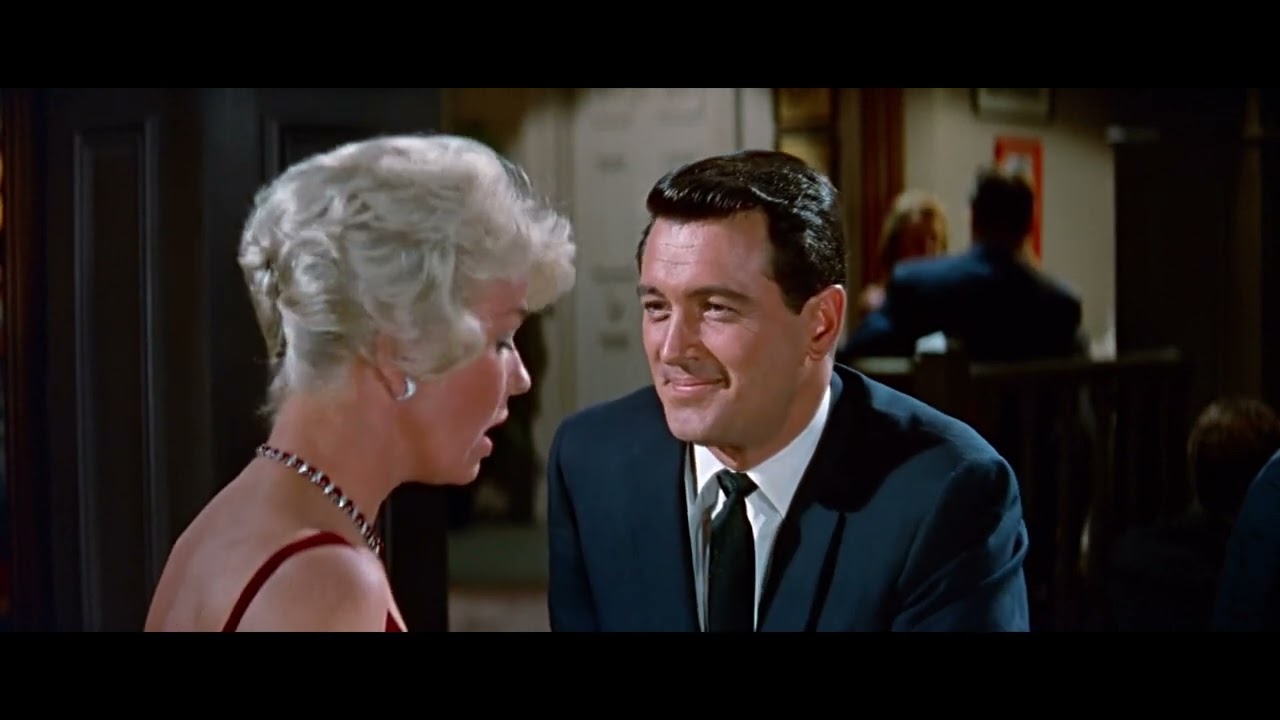 Rock Hudson pretends to be gay to kiss Doris Day in Pillow Talk