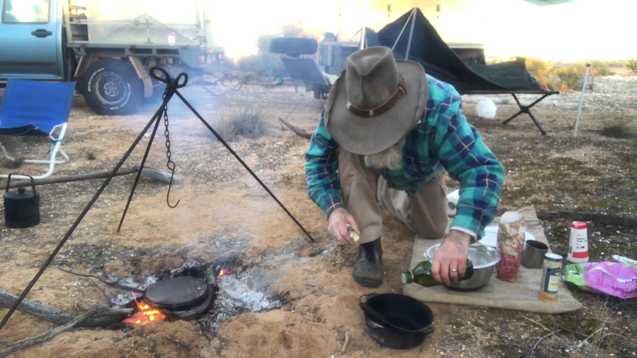 Cooking A Damper For Breakfast In The Camp Oven
