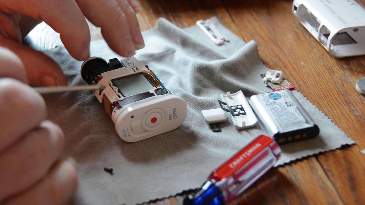Sony HDR-AS100V battery door replacement.