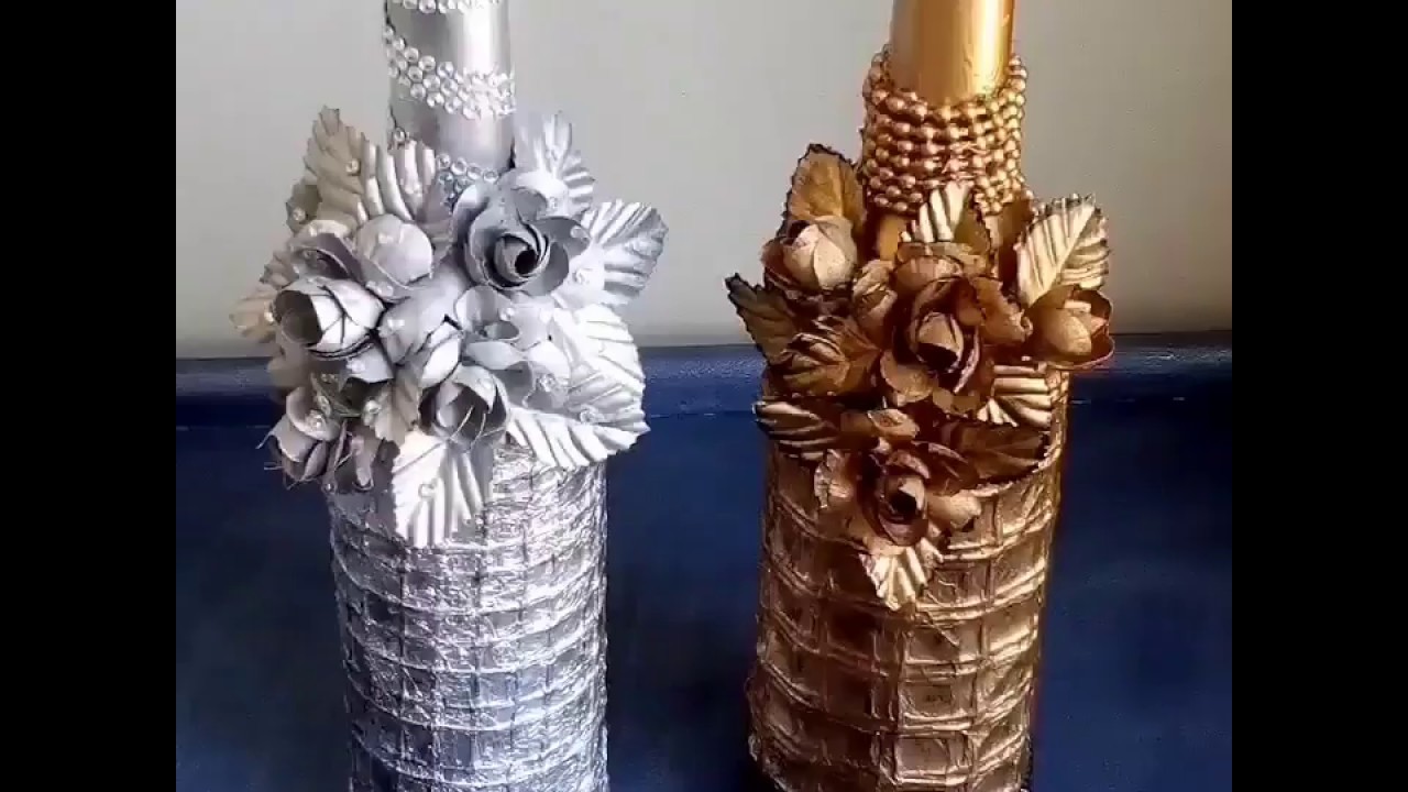 Como decora una botella de cristal con papel aluminio