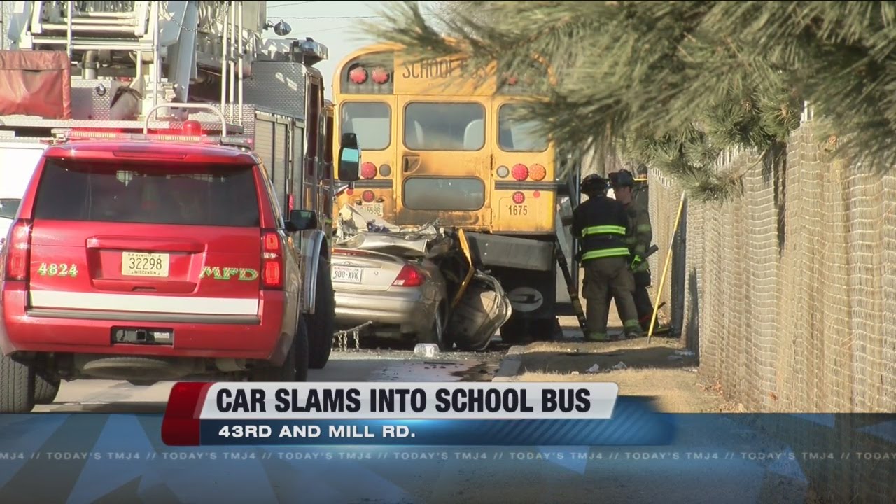 1 dead after car crashes into school bus in Milwaukee