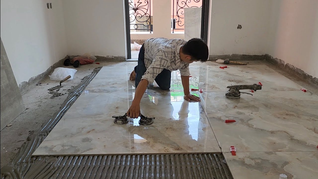 cách tuấn 1 mình lát gạch nền khổ 1200x1200 chuẩn đẹp hoàn thiện 1 phòng nhà lâu đài