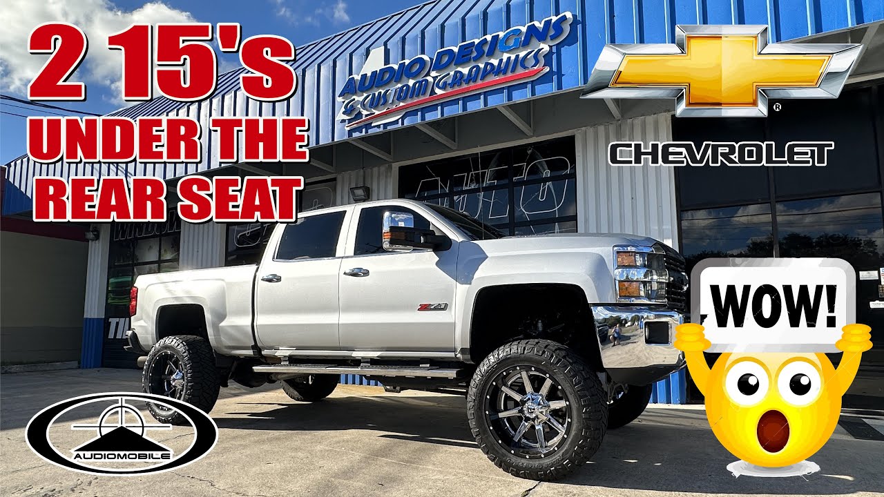 15-дюймовые динамики под сиденьем грузовика Chevy. Двойной корпус сабвуфера.