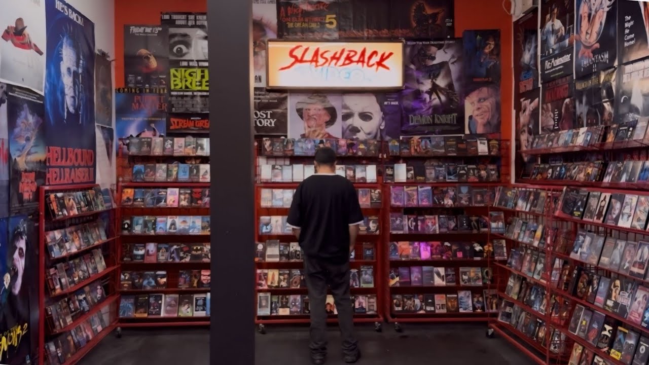 Inside SLASHBACK VIDEO 80’s / 90’s Horror Video Rental Store immersive exhibit and themed photo ops 