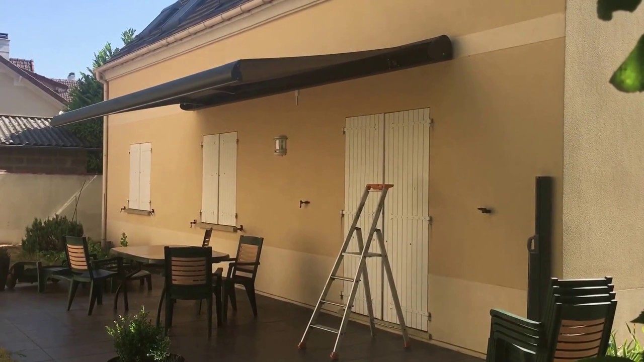Réalisation d'un store banne avec lambrequin déroulable motorisé