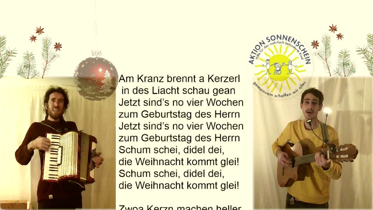 Am Kranz brennt a Kerzal