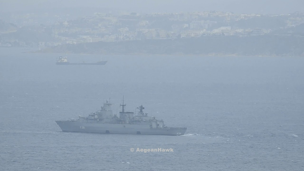 German Navy Frigate F218 FGS Mecklenburg-Vorpommern in very low speed monitoring Chios Strait.