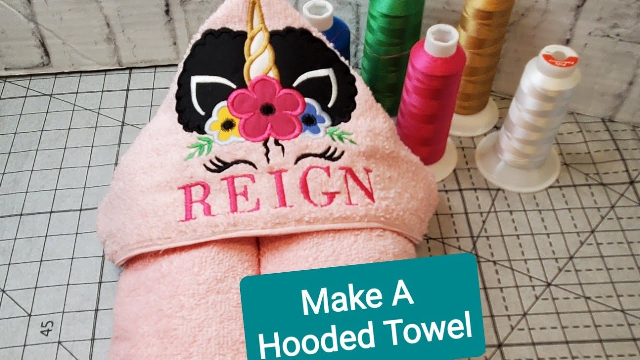 Machine Embroidered and Sewn Hooded Towel Enclosed Hood - No embroidery rubbing on head.