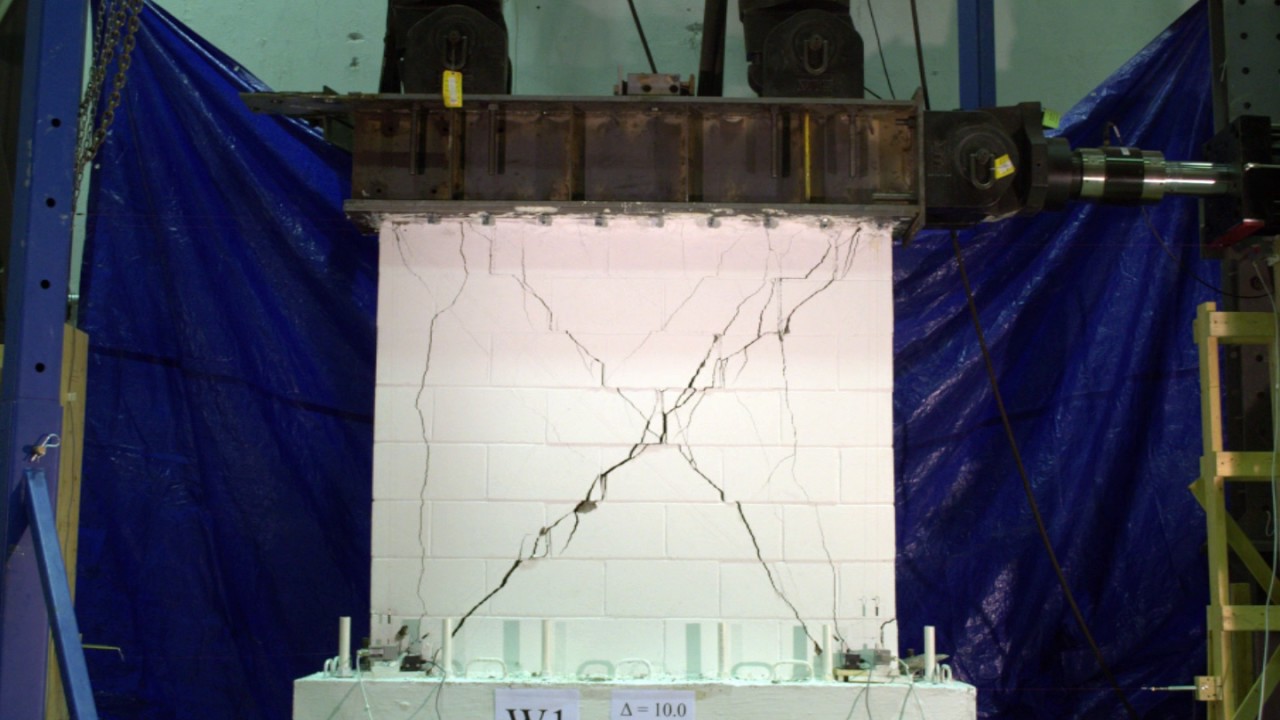 Cyclic load testing of reinforced masonry shear walls