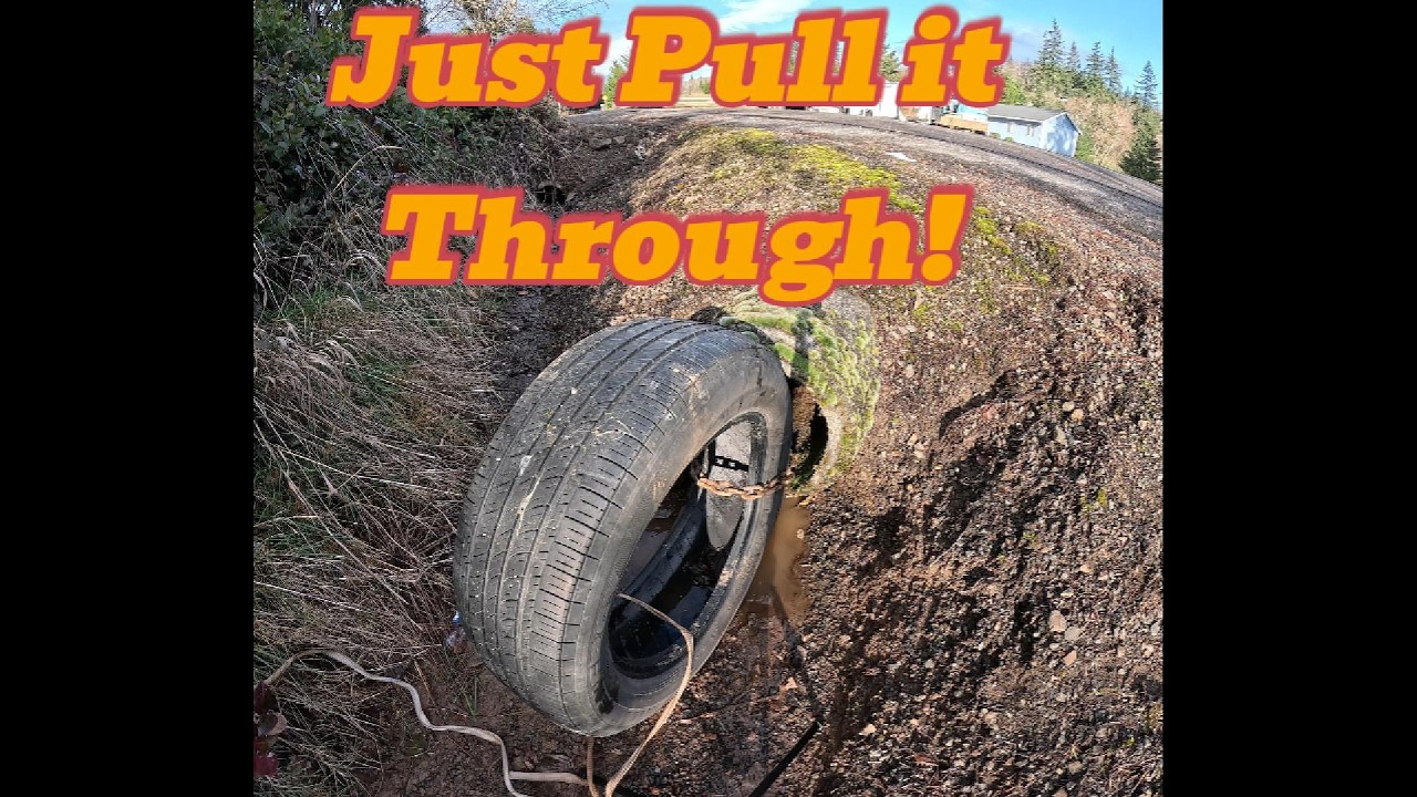 Cleaning out a Culvert Using a Car Tire