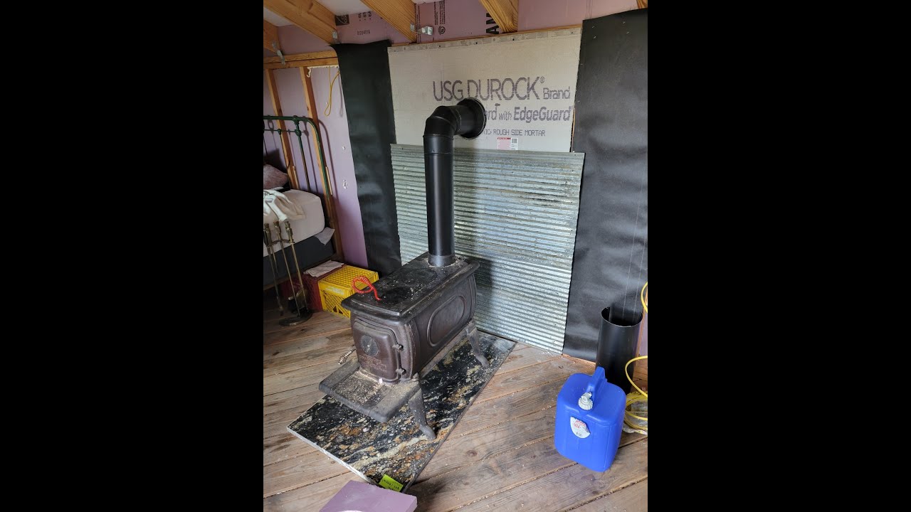 Deep in Thought with the Stove Pipe Install at the Off Grid Cabin #36
