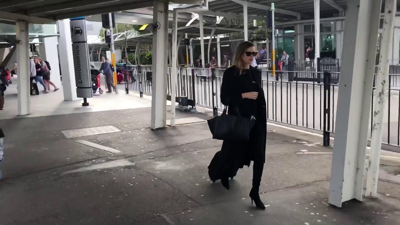 Victoria lee in all black arrives back home
