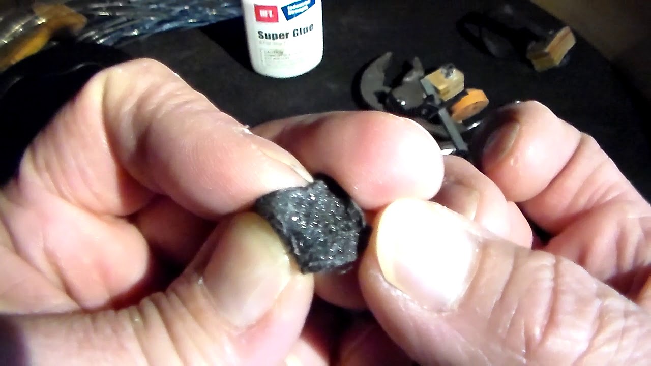 Tiny strap wrench improved
