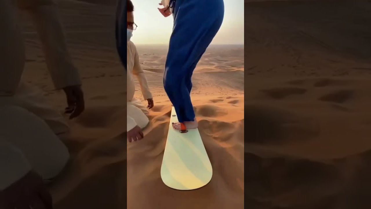 Sand boarding in desert Dubai