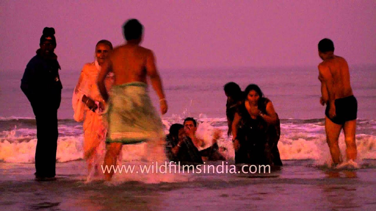 Holy dipping by pilgrims at Gangasagar