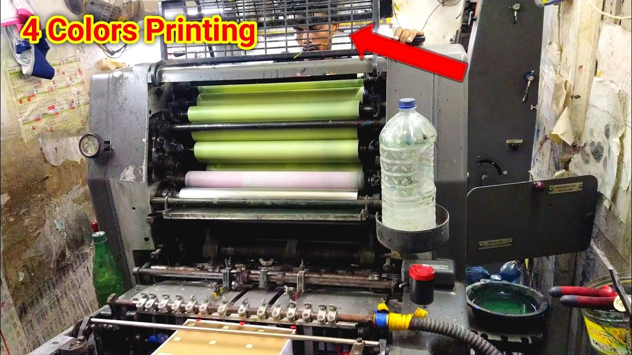 Color Matching And Art Paper Printing By Heidelberg Offset Printing Machine. 4 Colors Printing.