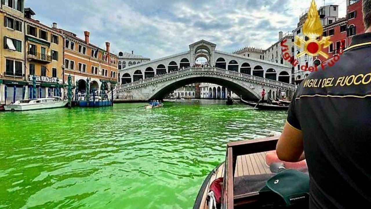 Venice canals dyed green by climate activists