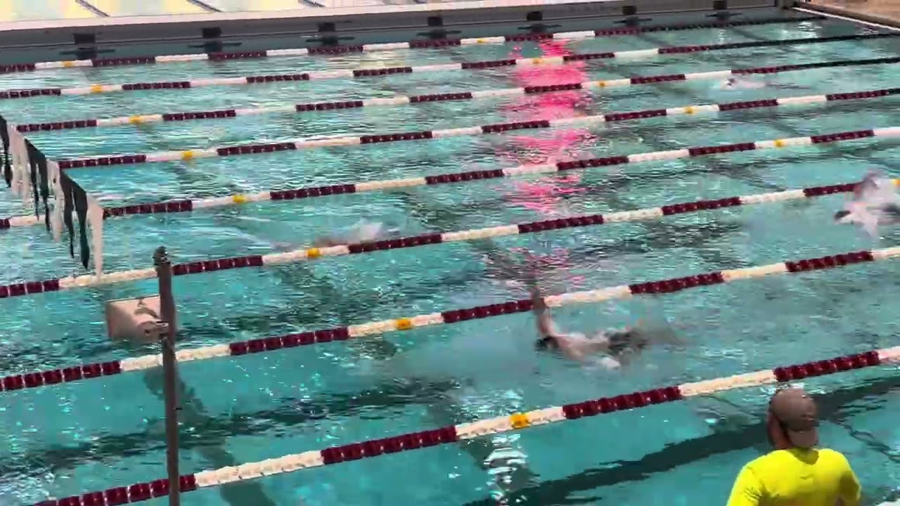 C. Gorman swims the 400IM SCY in lane 4 (white cap) in Oct. 2025.