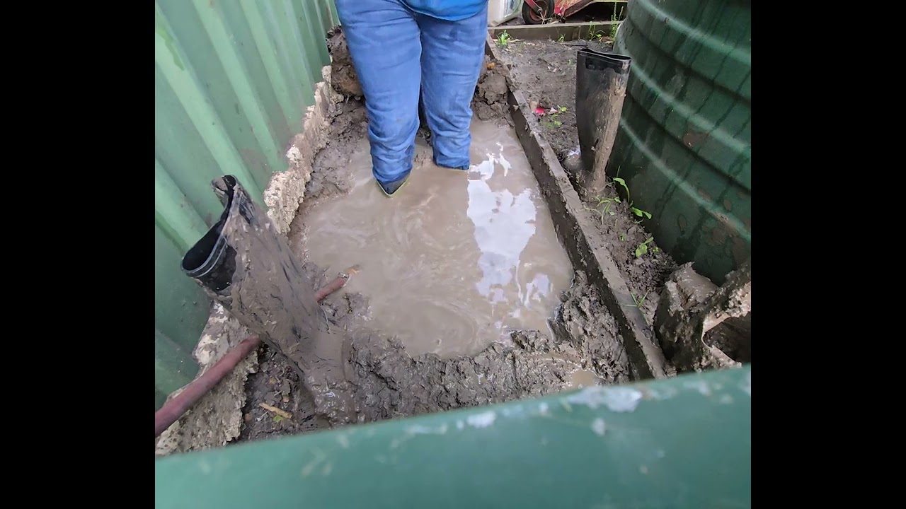 Nora Wellies stuck in a mud pit