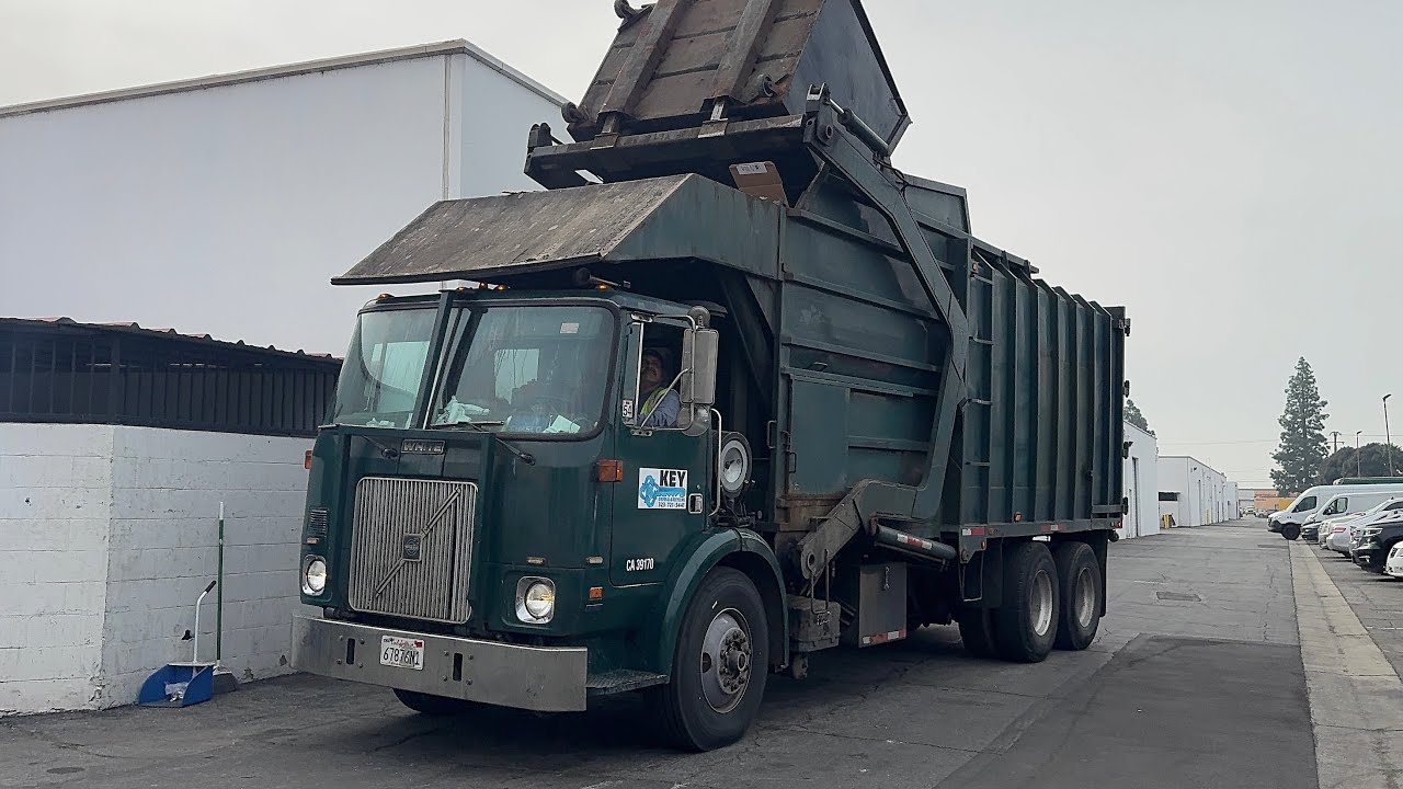 Key Disposal- Old Square Body Garbage Truck in Action