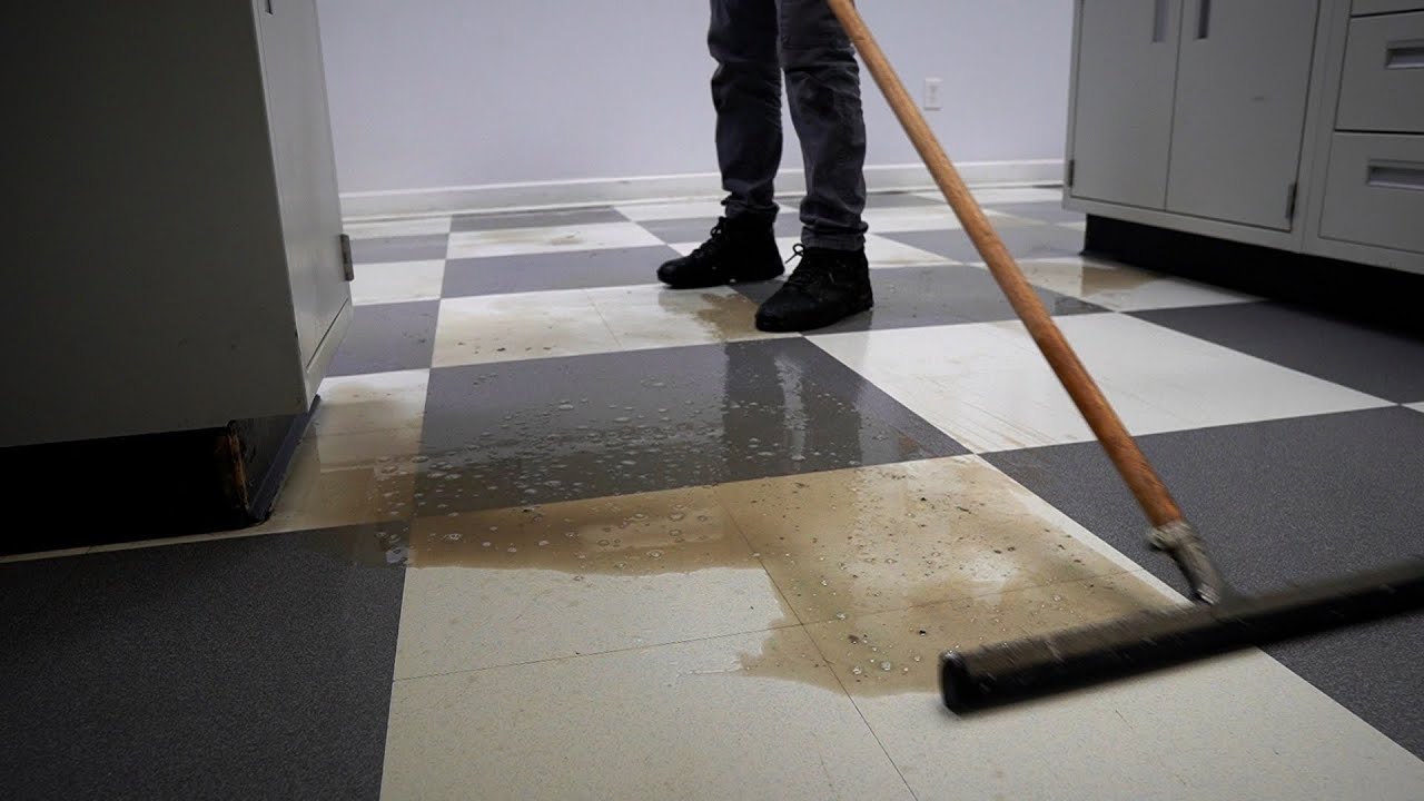 We stripped YEARS of old wax off of this old factory lab floor || Ashy to Classy VCT transformation