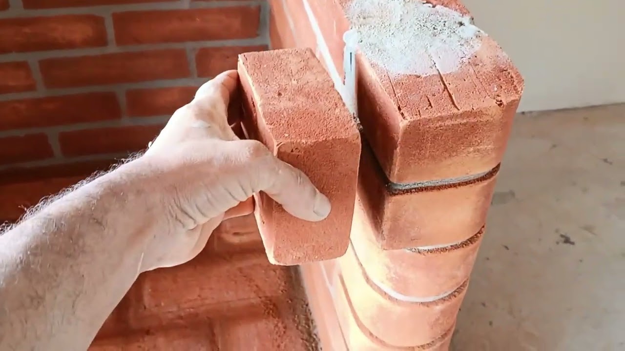 Construindo churrasqueira com tijolos vermelho 