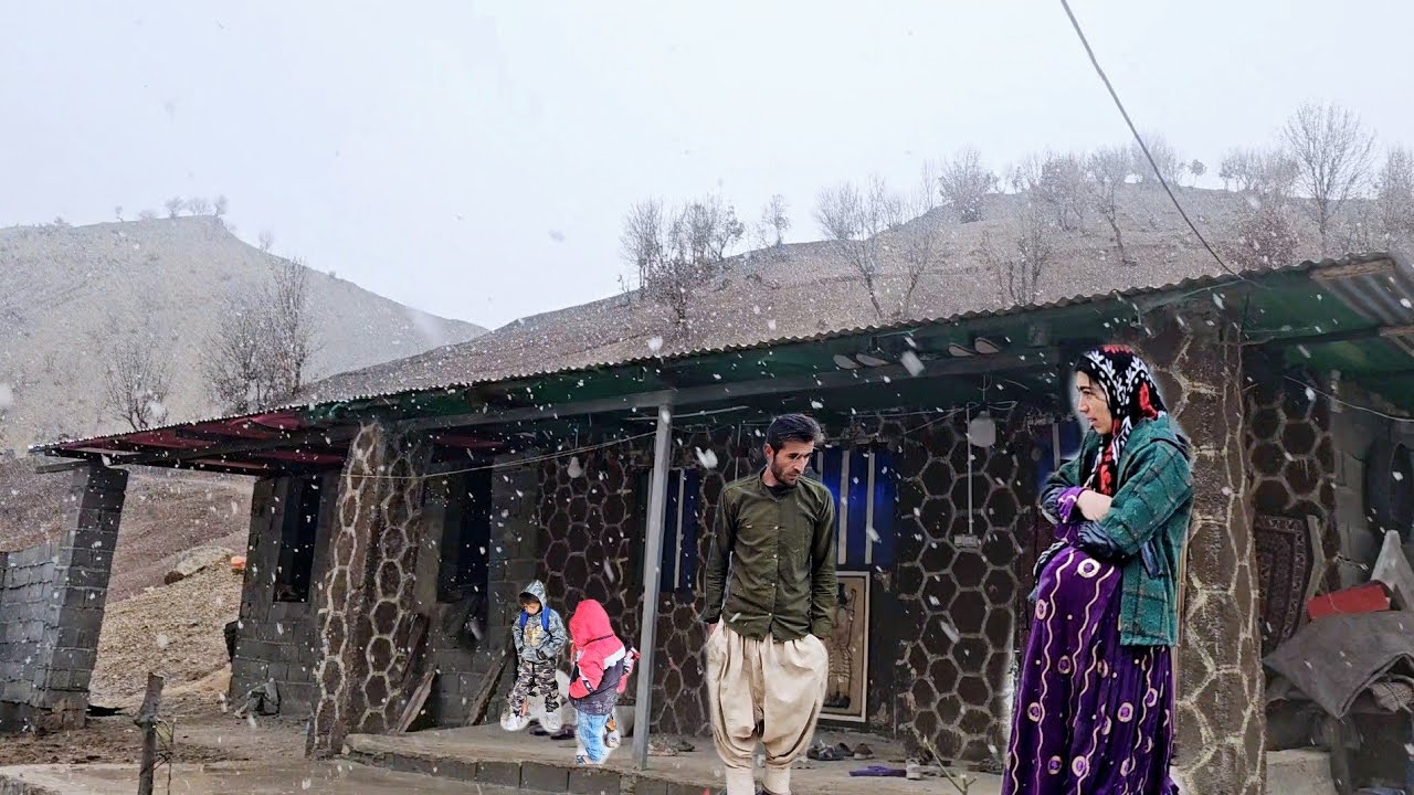 Snowy day ☃️ in the village.  Babak and Narges continue to build on the coldest winter day❄️❄️