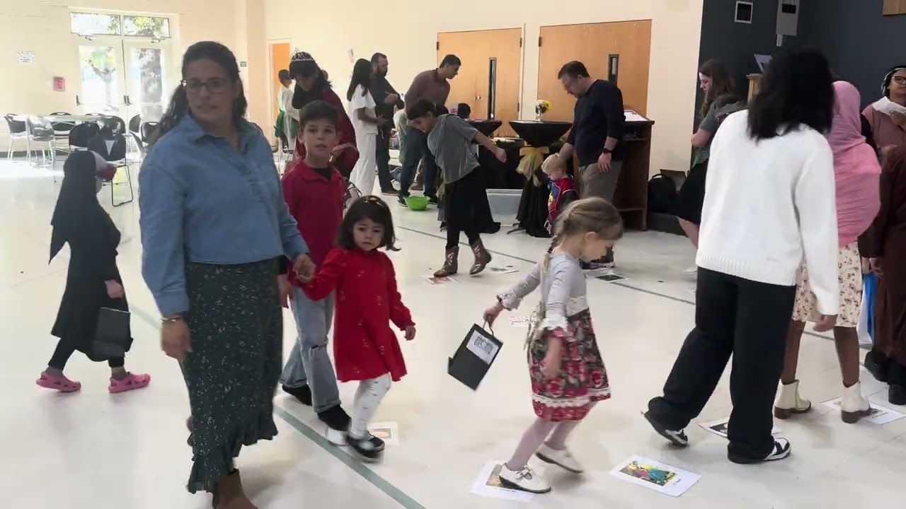 Annmaria doing cake walk 2025