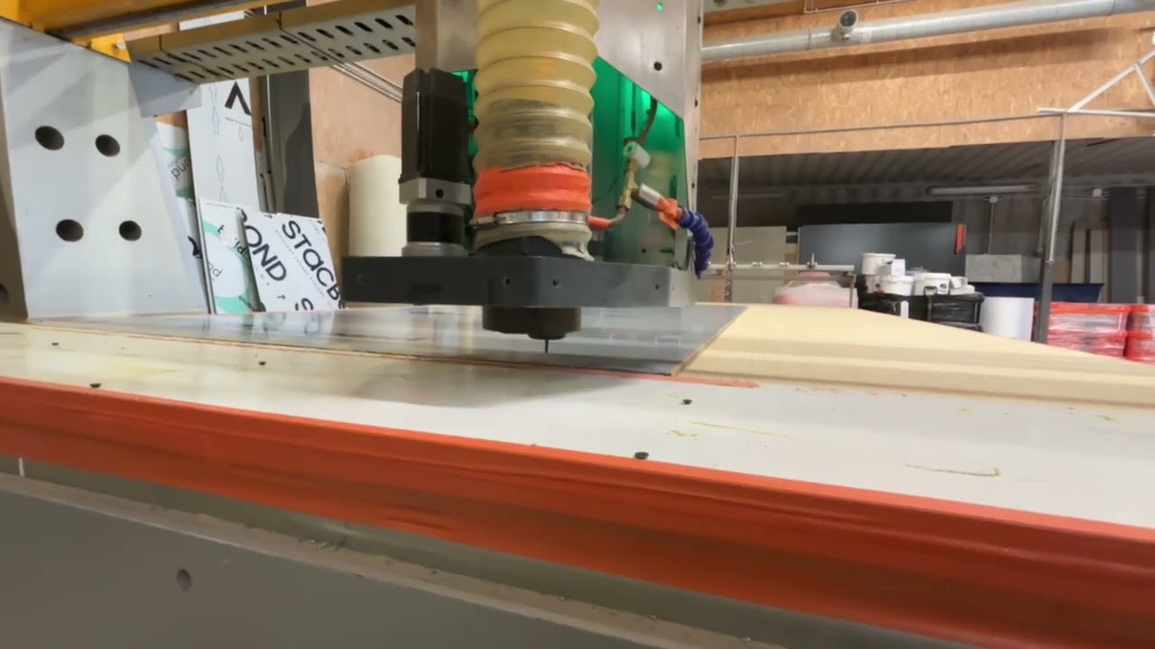A high-precision machine creates a perfect finish for houses.