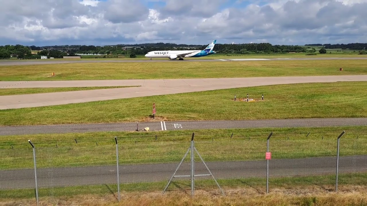 Westjet Boeing 787-9 Landing and Close taxi at Edinburgh Airport Scotland.