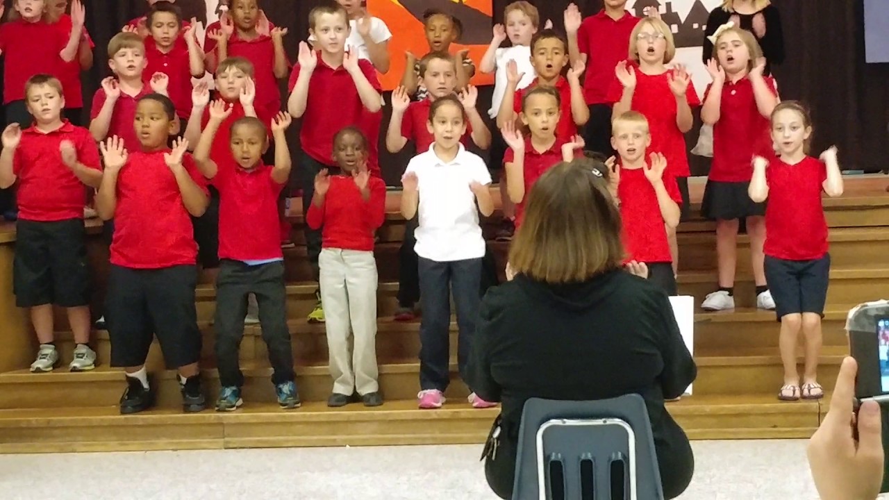 Tresia performing Disney songs at her school