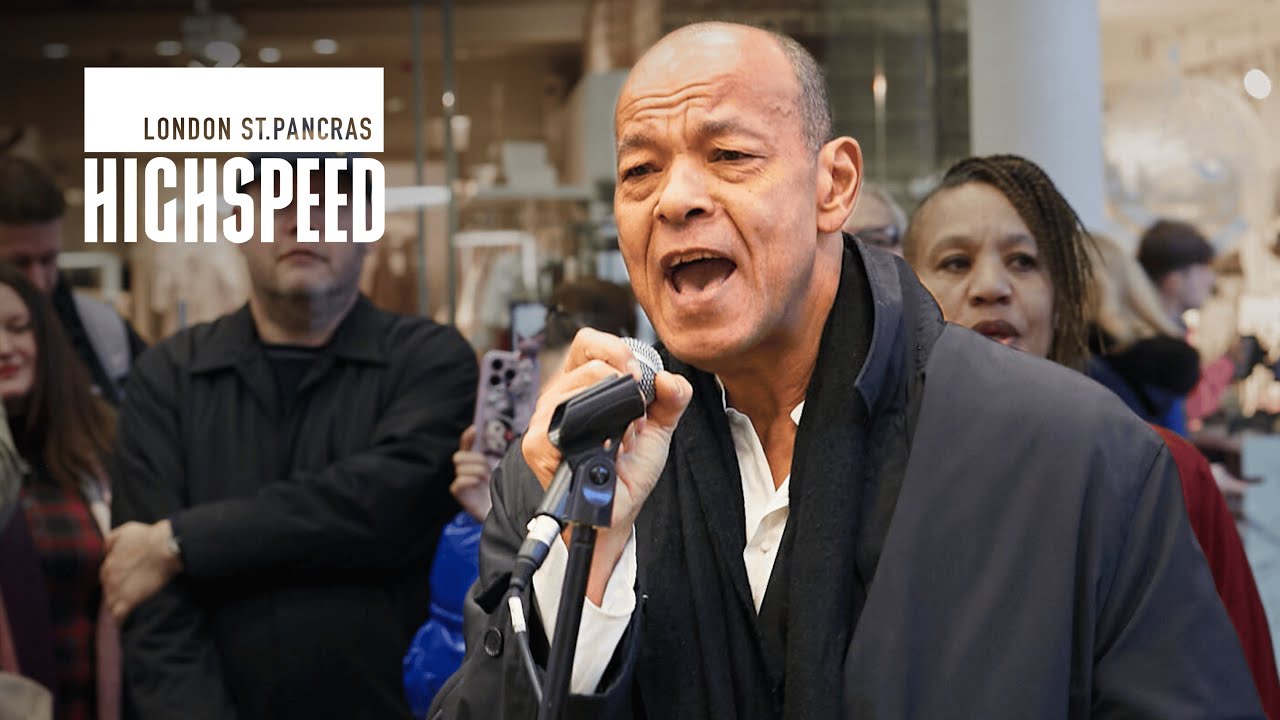Roland Gift surprise festive performance at St. Pancras International