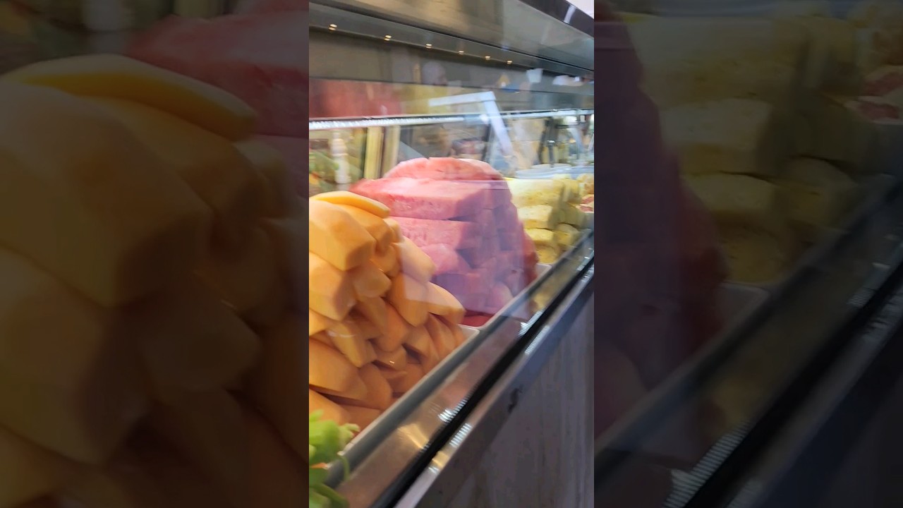 Stall selling fruit juice in Sydney Fish Market