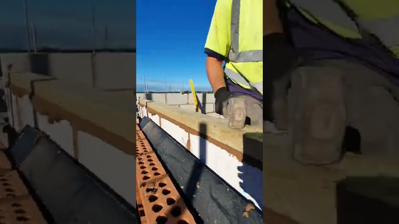 Układanie płyt ściennych w piękny dzień