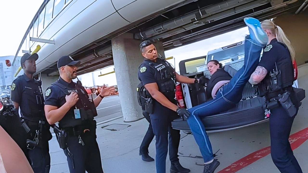 Woman Attacks Boy's Mother - Resists Police at Orlando Airport | Police Bodycam