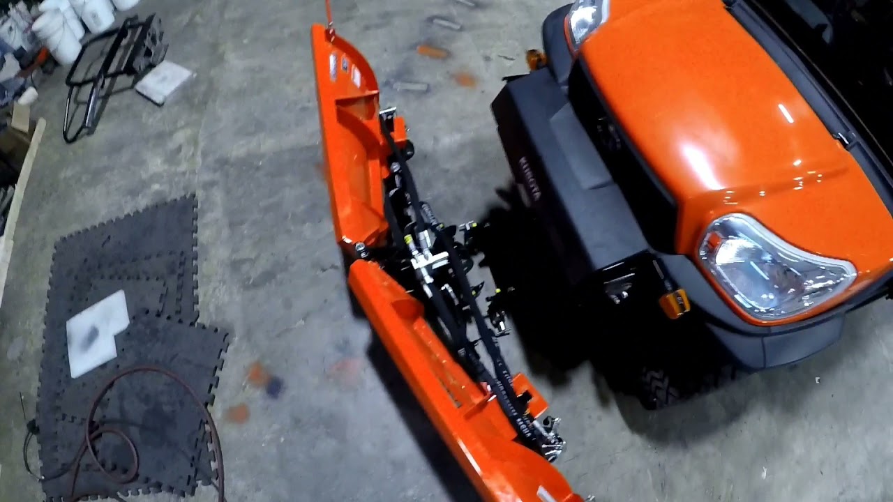 Kubota rtv1100  /  squaring away the V blade..