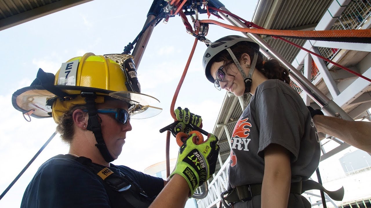 Girl Scouts learn how to rappel at Camp Fury