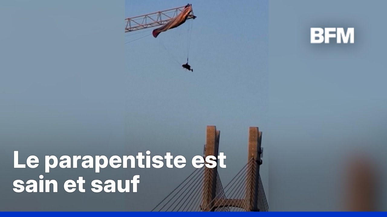 Chine : un parapentiste suspendu dans le vide apr&egrave;s s'&ecirc;tre accroch&eacute; &agrave; une grue